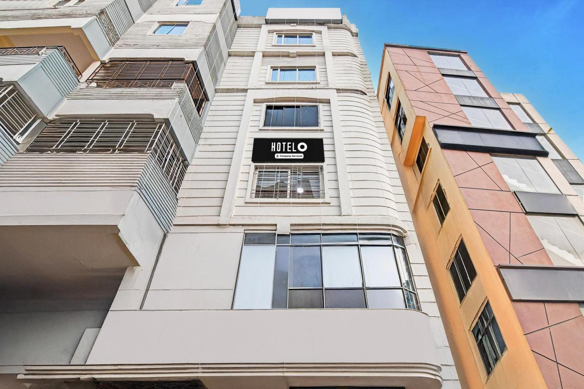 Super Hotel O Baguiati Nagarbazar Bagian luar foto